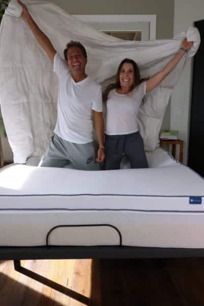 A happy couple with their Nestled organic latex mattress topper.