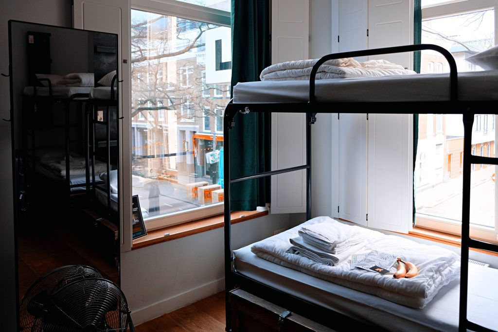 Bunk beds with a view of a city