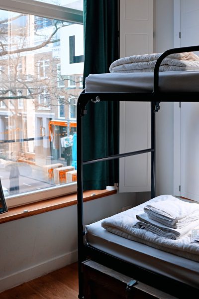 Bunk beds with a view of a city