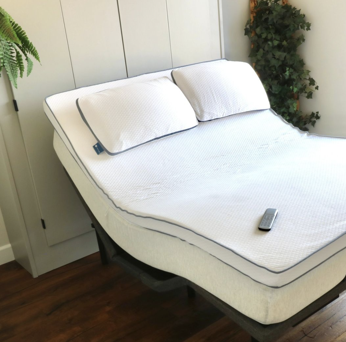 A natural latex mattress topper with two organic pillows